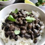 Slow Cooker Brazilian Black Beans are thick, rich, and delicious! Serve as a side or main over rice.