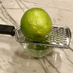 Zesting lime for Cilantro Lime Yogurt Chicken, Peppers & Broccoli.