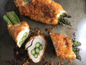 4-Ingredient DORITO CHICKEN and Asparagus Rolls!  Yes, Doritos, my friend.  The Doritos add a salty and crispy crust to the outside of the chicken with a hint of cheesy flavor.  The Chicken stays moist and juicy rolled up and you get this fresh bite of Spring in the center with the Asparagus.