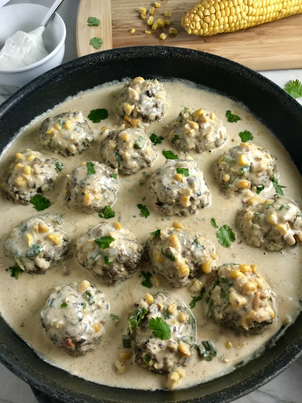 Chipotle Black Bean Recipe Meatballs with Mexican Corn Cream Sauce are delicious! The meatballs are made with Chipotle peppers in adobo sauce, black beans, and scallion and are baked to perfection. The creamy sauce is inspired by Mexican Street Corn with sweet corn, smokey Mexican spices, cool and tangy sour cream.