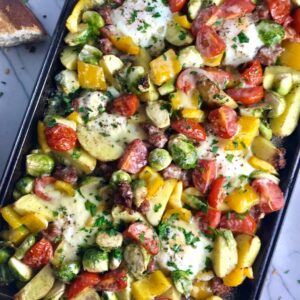 This One Pan Italian Sausage and Eggs is LOADED with flavors and textures. You get the salty Italian Sausage, sweet bell pepper, creamy potatoes, sweet and juicy tomatoes, meaty brussel sprouts, creamy eggs, and salty, nutty cheddar cheese. Best of all, the entire meal cooks on one large pan!