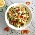 This Veggie Quinoa Salad with Lemon Dressing is a cool, refreshing, but filling and delicious salad that can stand alone or be a great side dish. It has so many fresh and flavorful vegetables including cucumber, sweet peppers, radicchio, scallions, and parsley. The dressing is a bright Creamy Lemon Dressing with Lemon, honey, mustard, and sour cream.