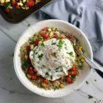 This 5-ingredient Sunny Quinoa with Fried Egg & Veggie Medley is simple, but incredible. The Veggie Medley is a trifecta of red pepper, zucchini, and sweet corn that are roasted on a sheet pan. Then on top of it all is a salty fried egg with a runny yoke that oozes out to bring a deep creaminess to the entire dish.