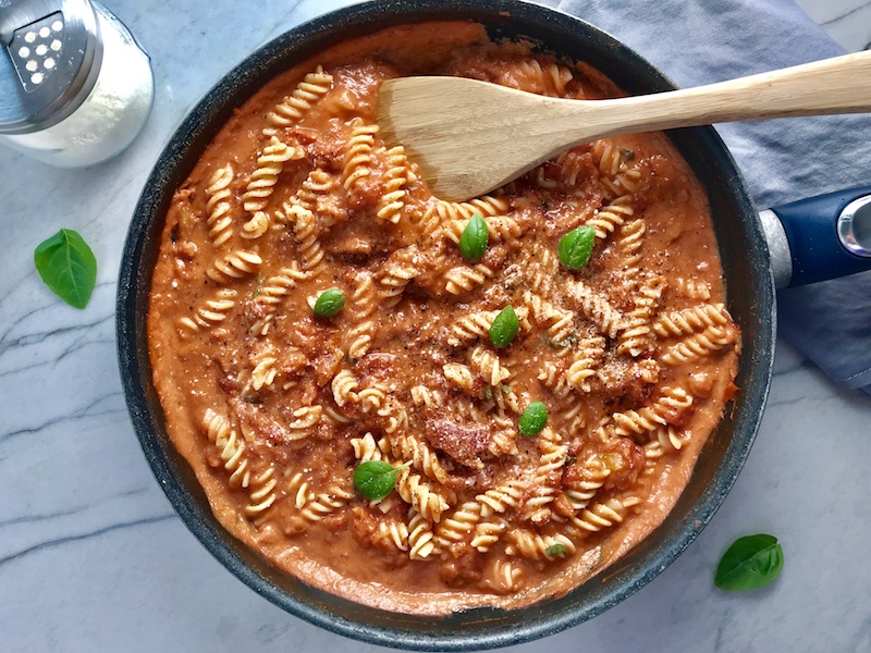 This Tomato Cream Sauce Pasta tastes amazing - and it's amazingly simple to make!! I call it Luscious because the tomatoes, which are still slightly chunky become this thick, creamy, smooth, velvety, and flavorful sauce. The combination of the San Marzano tomatoes and sour cream takes a simple red sauce to a perfect pink heavenly cream sauce!