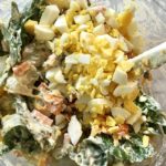 This Fully Loaded Potato Salad has salty bacon and cheddar cheese, creamy and rich egg, fresh scallions and baby spinach, and crunchy carrots. The dressing is simple with a blend of yellow mustard and mayo. Make ahead and enjoy later! YUMM-Y!