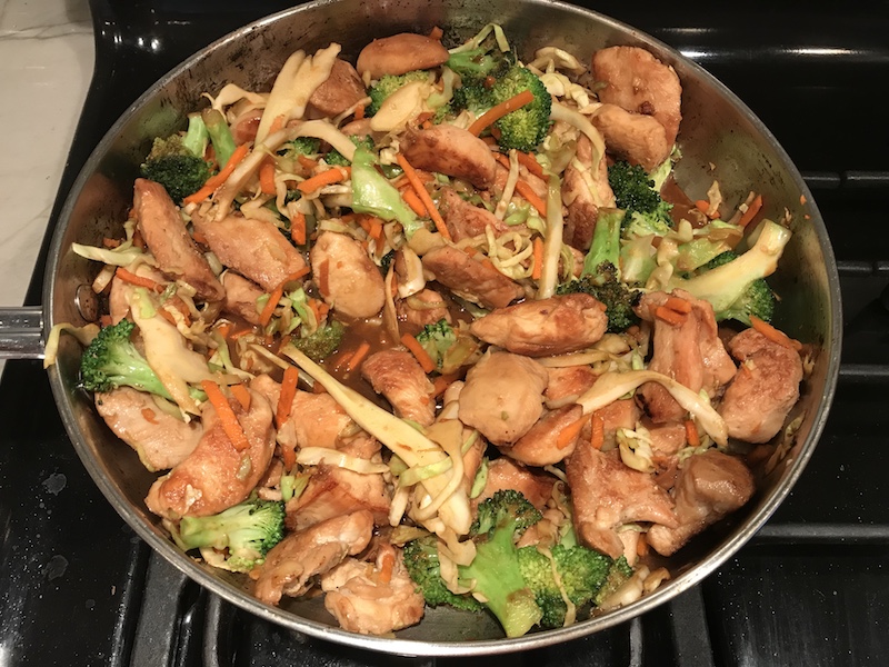 Peanut Teriyaki Chicken and Broccoli stir fry with rice noodles is a simple, delicious, one pan dinner option. It's also Gluten Free! You get the amazing flavor from the combo of peanut butter, teriyaki sauce, and sesame oil mixed with the Chicken, Broccoli, cabbage, and rice noodles...YUM!