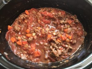 Anniversary Slow Cooker Beef Bolognese is a souped-up version of the traditional Italian Meat Sauce made EASY in the slow cooker! The flavors of the ingredients with the meat become one and turn into this amazing thick sauce. I add even MORE FLAVOR with Pancetta and Demi-Glace. Delicious!
