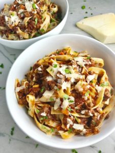 Anniversary Slow Cooker Beef Bolognese is a souped-up version of the traditional Italian Meat Sauce made EASY in the slow cooker! The flavors of the ingredients with the meat become one and turn into this amazing thick sauce. I add even MORE FLAVOR with Pancetta and Demi-Glace. Delicious!