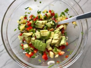 Fresh, bright, sweet, creamy, crunchy, and bursting with flavor, this Zippy Pineapple Salsa has red pepper, jalapeño, cilantro, scallion, lime, and avocado. It's the perfect topping for just about anything grilled. It's also just perfect for eating with chips or as a salad on it's own!