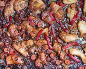Hoisin Chicken and Red Peppers Cooked on sheet pan. This Freezer Hoisin Chicken with Red Peppers, Carrots, Onions, Ginger, and Soy sauce is delicious and so easy to make. You get sweet and savory all in one dish and it's perfect for kids because it's sweet, not spicy at all. Just freeze ahead, thaw, then cook on a sheet pan!