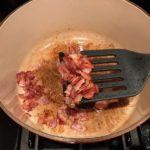Cooked bacon in pot for the Easy Bacon Brussel Sprouts and Chicken recipe. It's a perfect quick Fall Recipe!  It has a creamy sauce filled with salty bacon, earthy and almost nutty seared brussel sprouts, and hearty healthy chicken. Serve over rice (or Quinoa or pasta!).
