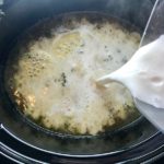 Adding slurry thickener to Light Slow Cooker Creamy Broccoli Soup. This is easy, comforting, and delicious! With Carrots, Broccoli, Onion, Garlic, and Oregano, this is one flavorful soup. And, there is no heavy cream, just milk and a little half and half mixed with cornstarch, so it's healthy and gluten free!