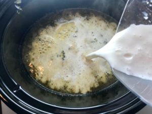 Adding slurry thickener to Light Slow Cooker Creamy Broccoli Soup. This is easy, comforting, and delicious! With Carrots, Broccoli, Onion, Garlic, and Oregano, this is one flavorful soup. And, there is no heavy cream, just milk and a little half and half mixed with cornstarch, so it's healthy and gluten free!