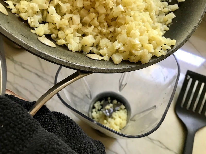 Adding cooked Cauliflower to blender for Meatballs in Cauliflower Dill Cream Sauce. The cauliflower sauce with garlic, fresh dill, cream cheese, and tomato paste. #meatballs #swedishmeatballs #familydinner #easydinner #dinner #healthydinner