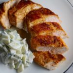 Hungarian Paprika Chicken sliced on plate. The paprika gives beautiful color and a deep, peppery flavor. #chicken #easychicken #easydinner #dinner #healthydinner