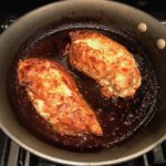 Cooked Chicken in skillet for Sesame Sweet Chili Chicken recipe. It is slightly sweet, tangy, savory, nutty, with a touch of heat. You can prepare it days ahead, it takes just minutes to prepare, minutes to cook, and everyone will love it!! #chicken #marinades #easydinner #easychicken #chickenrecipes #easysauces #healthydinner #healthyfood #healthyrecipes
