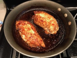 Cooked Chicken in skillet for Sesame Sweet Chili Chicken recipe. It is slightly sweet, tangy, savory, nutty, with a touch of heat. You can prepare it days ahead, it takes just minutes to prepare, minutes to cook, and everyone will love it!! #chicken #marinades #easydinner #easychicken #chickenrecipes #easysauces #healthydinner #healthyfood #healthyrecipes