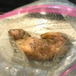 Mediterranean Chicken marinating in a storage bag. This Mediterranean Marinade is only a few ingredients, can be made ahead, and is delicious!