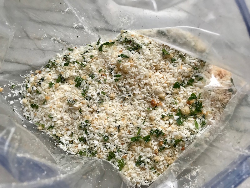 Coconut Breadcrumb mixture in a bag for Baked Coconut Cauliflower Bites.  They have a slightly sweet and salty crunch outside from the shredded coconut and panko mixture.  The inside is soft and creamy.  Dip in the Sriracha Mayo.  Baked, not fried, so healthy!  Easy to make, easy to eat! #cauliflowerrecipes #healthyrecipes #sidedishes #appetizers #healthysnacks