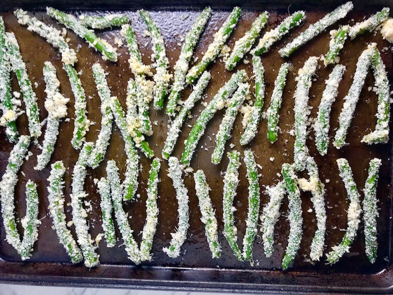 Raw Parmesan Green Bean Fries on sheet pan.  Such a great way to transform beans and add a new vegetable into dinner rotation. #vegetablerecipes