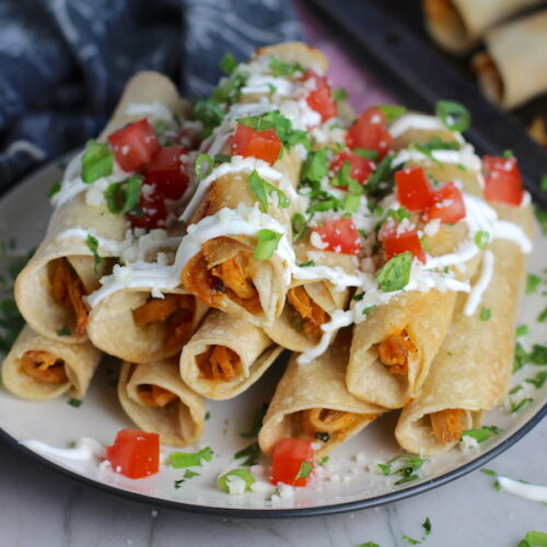 Baked Not-too- Spicy Chicken Taquitos Recipe - Talking Meals