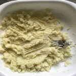 Mashed cauliflower and potato in dish for Cauliflower Gnocchi, which are soft, silky, buttery, and melt-in-your-mouth! Made with cauliflower, they're a healthier version to traditional gnocchi! Add my simple Garlic Butter Sauce or Tomato Sauce and they are heaven.  #dinnerideas #gnocchi #cauliflower