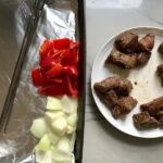 Separate portions of beef, onion and red pepper for Garlic Steak Kabobs. #beefkabobs #steakkabobs