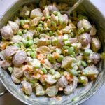 Red Potato Salad Recipe with Edamame and Harissa in a pot. It's creamy, crunchy, meaty, tangy, peppery, salty, and oh, it's UNBELIEVABLE!