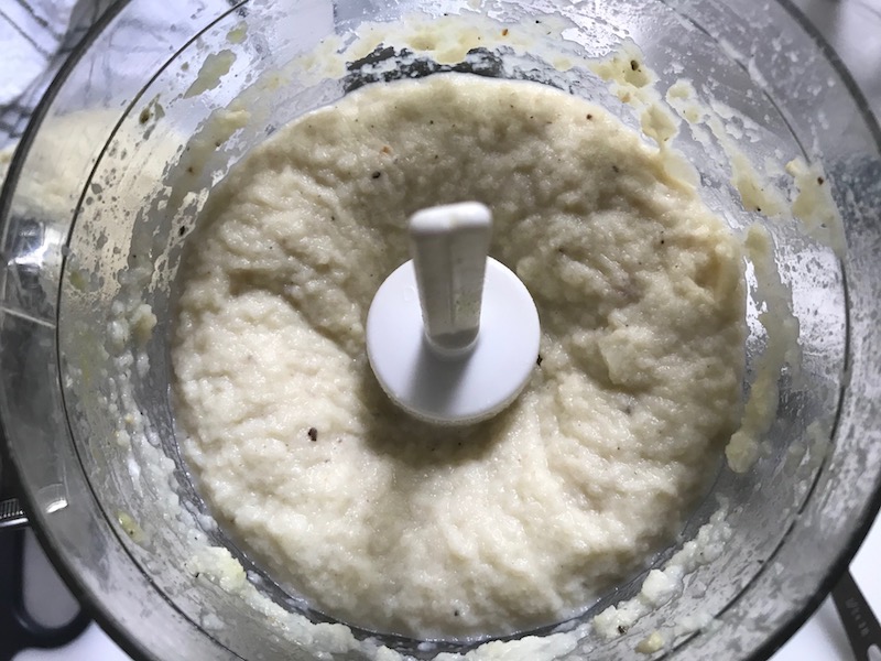 Cauliflower Mash puree in food processor for Roasted Garlic Cauliflower Mash.