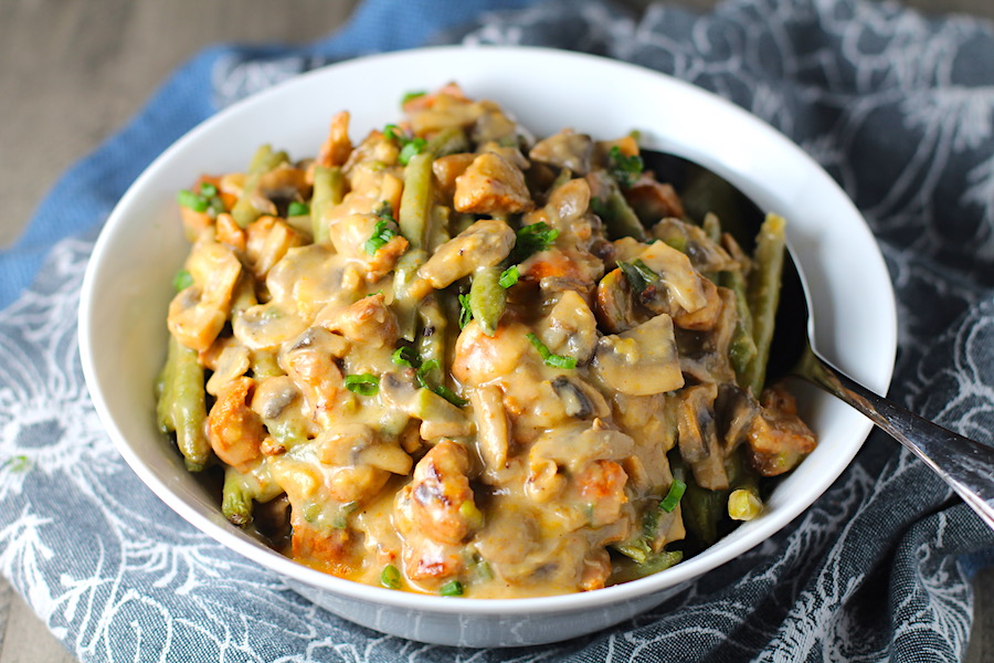 Creamy Green Beans and Mushrooms with Chorizo in a serving bowl are a creamy and savory side dish.