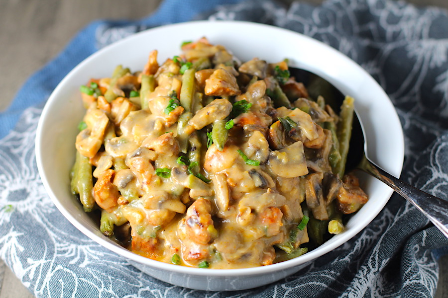 Chorizo Sausage and Green Bean Casserole in a serving bowl are a creamy and savory side dish. One of the best holiday side dishes.