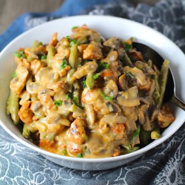 Chorizo Sausage and Green Bean Casserole in a serving bowl are a creamy and savory side dish. One of the best holiday side dishes.
