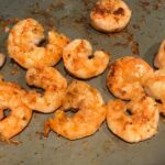 Cajun Shrimp cooking in a pan for Shrimp and Grits recipe.