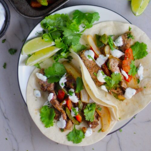 Sheet Pan Pork Fajitas Recipe - Talking Meals