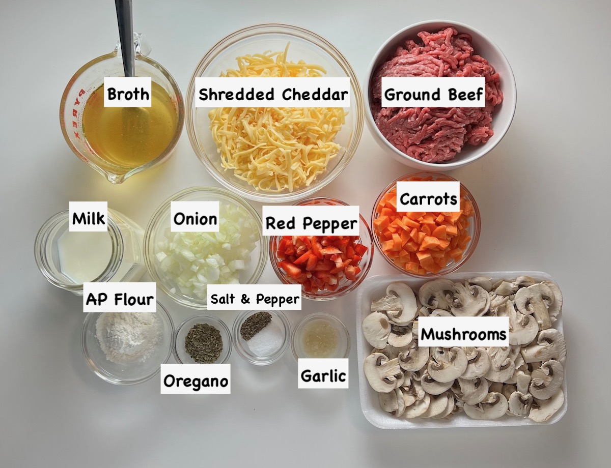 Ingredients prepped, measured out, and labeled in bowls for the Cheesy Hamburger Tater Tot Casserole recipe.