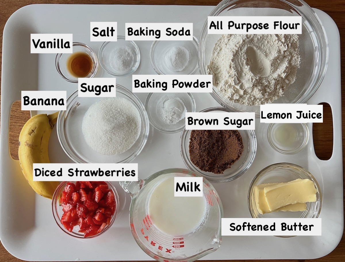 Ingredients prepped and measured out in bowls for the Strawberry Banana Cake Recipe.