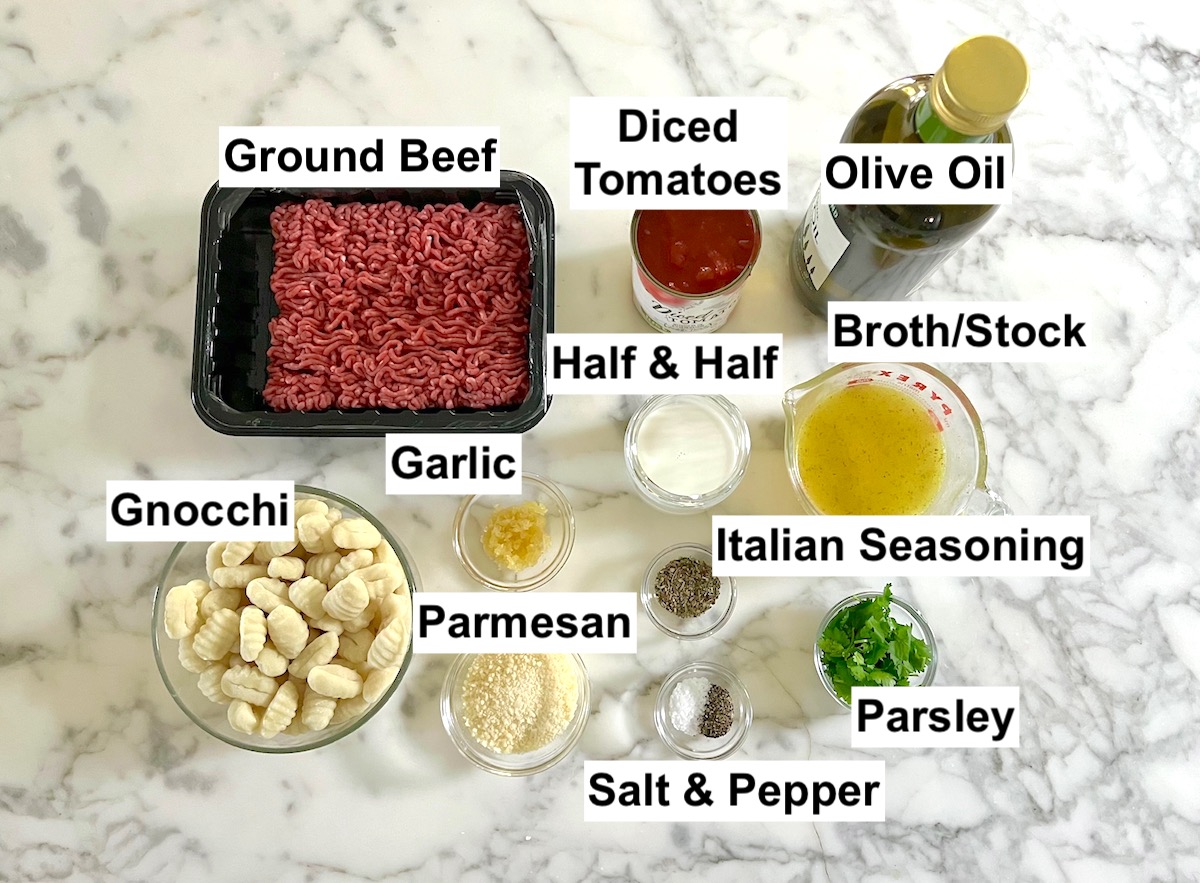 All ingredients measured out in bowls and labeled on counter for Ground Beef Gnocchi skillet recipe.