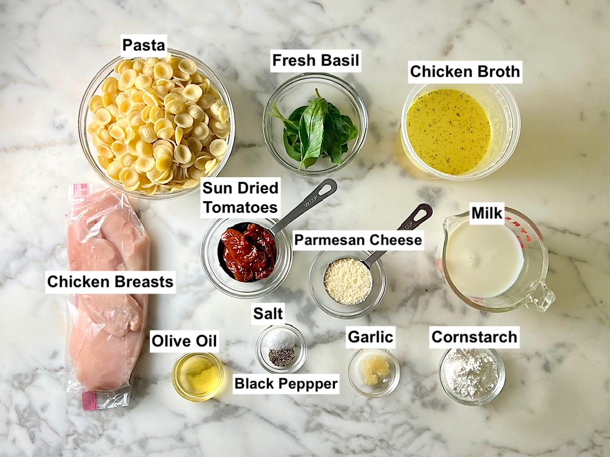 Ingredients prepped and measured out for Creamy Sun Dried Tomato Sauce with Chicken and Pasta recipe.