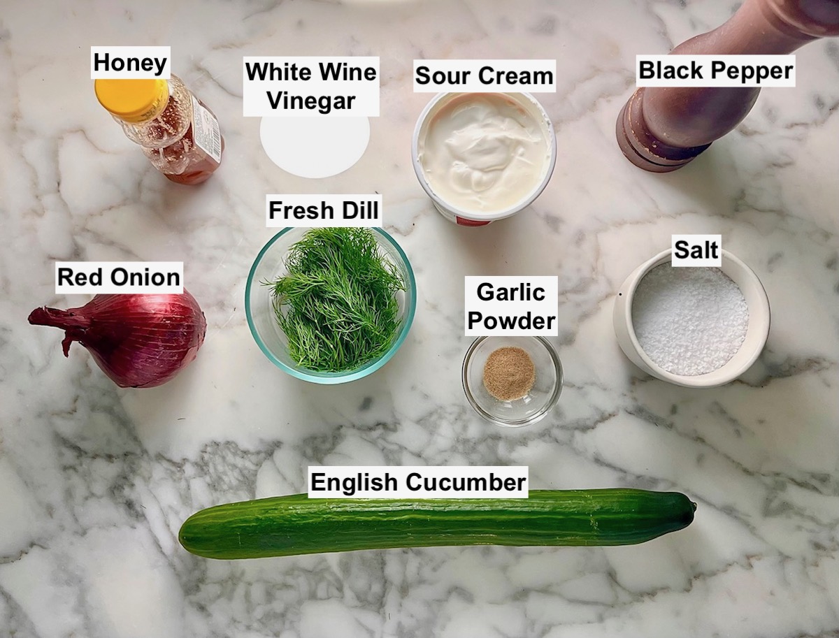 Ingredients prepped and measured out on the counter for the Dill and cucumber salad recipe.