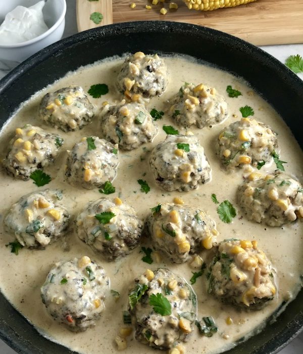 Chipotle Black Bean Recipe Meatballs with Mexican Corn Cream Sauce are delicious! The meatballs are made with Chipotle peppers in adobo sauce, black beans, and scallion and are baked to perfection. The creamy sauce is inspired by Mexican Street Corn with sweet corn, smokey Mexican spices, cool and tangy sour cream.