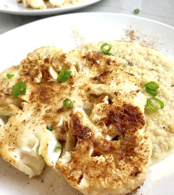 Since quinoa delivers protein, it’s a great opportunity to swap out meat for Cauliflower Steaks! These steaks can be grilled outside for an amazing meat alternative. This is a Creamy Parmesan Quinoa Mushroom Risotto recipe with garlic, parmesan, and mushrooms. Paired with the hearty Cauliflower steak spiced with Cumin, Chili Powder, and Garlic, this is the perfect meal!